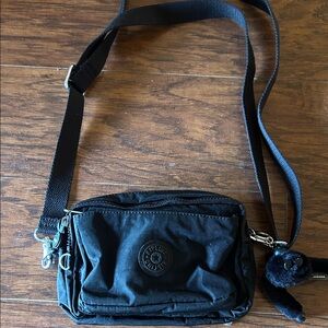 Kipling Black Crossbody Bag with Plush Charm